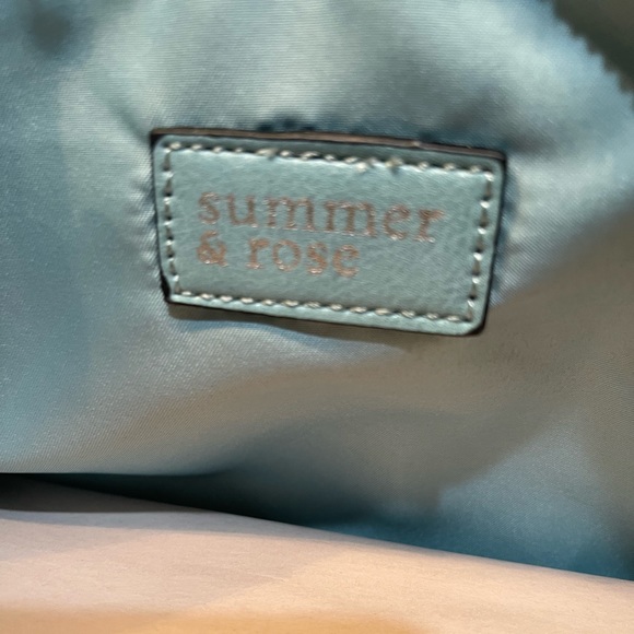 This handbag/makeup bag is a cute turquoise blueish color brand is summer & rose - Picture 3 of 5